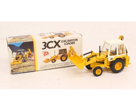 NZG: A boxed JCB 3CX Excavator Loader, NZG, Reference No. 216. Original box, general wear expected with age. Condition of the