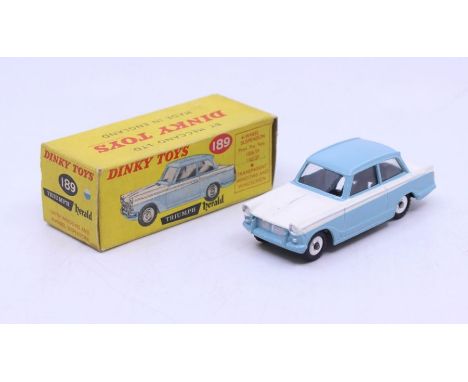 Dinky: A boxed Dinky Toys, Triumph Herald, Reference No. 189, two-tone blue and white body, silver hubs, correct colour spot 