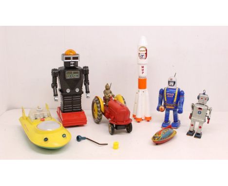 Tinplate: A collection of assorted battery operated and clockwork tinplate and other space related toys, to include: Space Ma