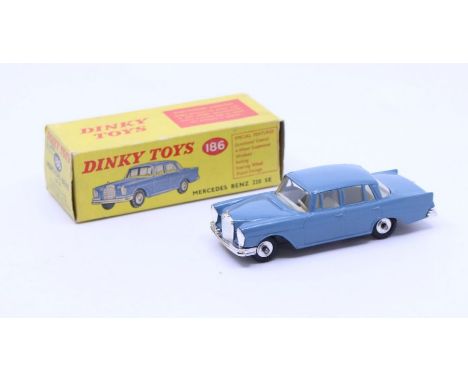 Dinky: A boxed Dinky Toys, Mercedes Benz 220 SE, Reference No. 186, greyish-blue body with off-white interior. Original box, 