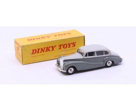 Dinky: A boxed French Dinky Toys, Rolls-Royce Silver Wraith, Reference No. 551, two-tone grey body. Original box, general wea