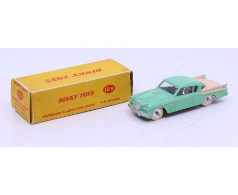 Dinky: A boxed Dinky Toys, Studebaker Golden Hawk, Reference No. 169, two-tone pale green and light beige. Original plain yel