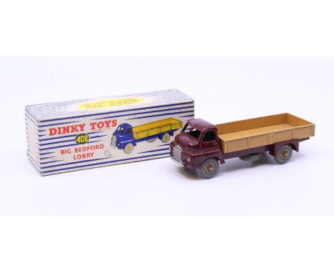 Dinky: A boxed Dinky Toys, Big Bedford Lorry, Reference No. 408, maroon cab and chassis, tan rear body. Original box, general