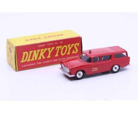 Dinky: A boxed Dinky Toys, Canadian Fire Chief's Car with Windows, Reference No. 257, red body. Original box, general wear ex