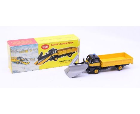 Dinky: A boxed Dinky Toys, Snow Plough (with Windows), Reference No. 958, yellow and black body with silver plough. Original 
