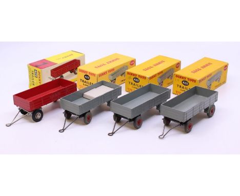 Dinky: A collection of four boxed Dinky Toys, Trailer, Reference No. 428, three in grey with red wheel hubs; one in red with 