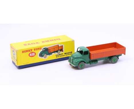 Dinky: A boxed Dinky Toys, Comet Wagon with Hinged Tailboard, Reference No. 418, green cab and chassis and orange back. Origi