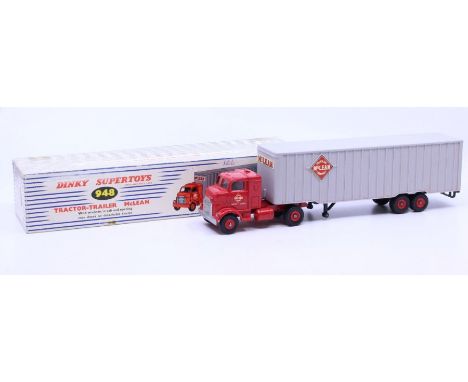 Dinky: A boxed Dinky Supertoys, Tractor-Trailer 'McLean', Reference No. 948, red cab and chassis, grey trailer. Original box,