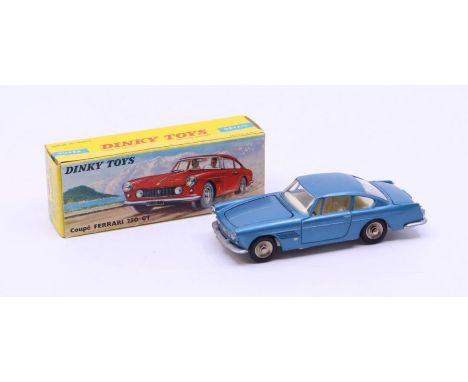 Dinky: A boxed French Dinky Toys, Coupe Ferrari 250 GT, Reference No. 515, metallic blue body with white interior. Original b