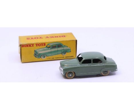 Dinky: A boxed French Dinky Toys, Simca 9 "Aronde", Reference No. 24U, green body. Original box, general wear expected with a