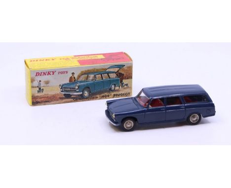 Dinky: A boxed French Dinky Toys, Commerciale 404 Peugeot, Reference No. 525, dark blue body with red interior. Original box,