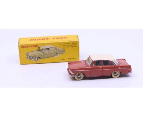 Dinky: A boxed French Dinky Toys, Opel "Rekord", Reference No. 554, coral body with off-white roof and grey interior. Origina