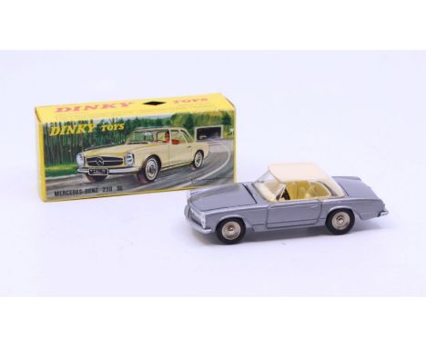 Dinky: A boxed French Dinky Toys, Mercedes-Benz 230 SL, Reference No. 516, silver body with cream roof and interior. Original