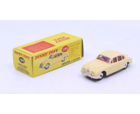 Dinky: A boxed Dinky Toys, Jaguar 3.4 Saloon, Reference No. 195, cream body with silver hubs, correct colour spot to box. Ori