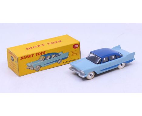 Dinky: A boxed Dinky Toys, Plymouth Plaza, Reference No. 178, two-tone blue, with silver hubs, correct colour spot to box. Or