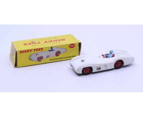 Dinky: A boxed Dinky Toys, Mercedes Benz Racing Car, Reference No. 237, white body, red interior, blue driver #36. Original b