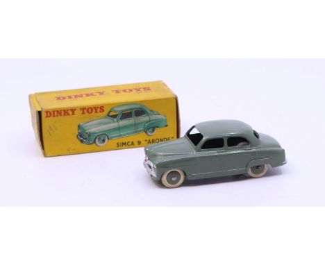 Dinky: A boxed French Dinky Toys, Simca 9 "Aronde", Reference No. 24U, green body. Original box, general wear expected with a