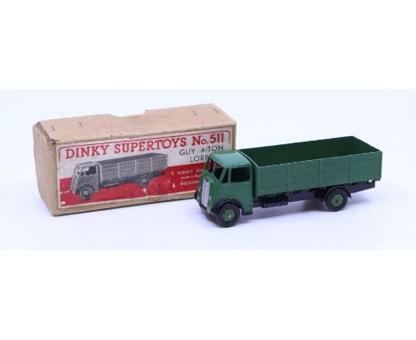 Dinky: A boxed Dinky Toys, Guy 4-Ton Lorry, Reference No. 511, green body with black chassis. Original box, general wear expe