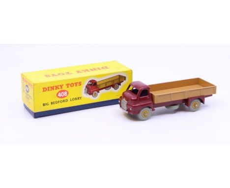 Dinky: A boxed Dinky Toys, Big Bedford Lorry, Reference No. 408, maroon cab and chassis, tan rear body. Original box, general