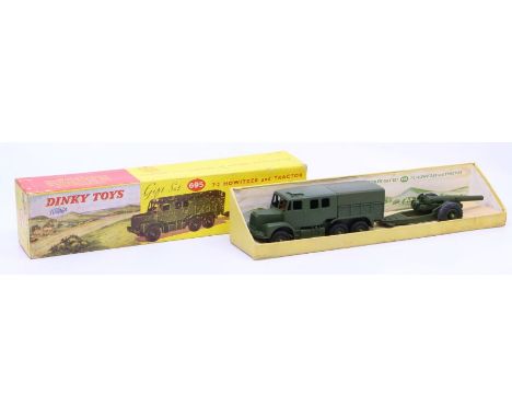 Dinky: A boxed Dinky Toys, Gift Set 7.2 Howitzer and Tractor, Reference No. 695, military green body. Original box, general w