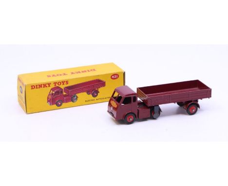 Dinky: A boxed Dinky Toys, Electric Articulated Lorry, Reference No. 421, maroon cab and body. Original box, general wear exp