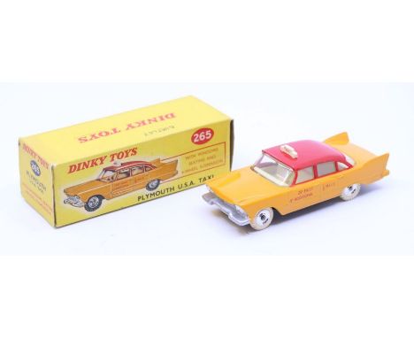 Dinky: A boxed Dinky Toys, Plymouth U.S.A. Taxi, Reference No. 265, yellow with red roof. Original box, general wear expected