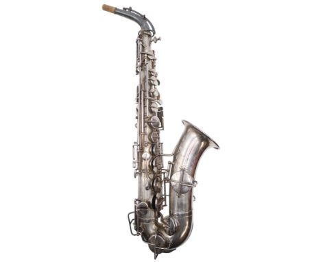 A MARTIN ALTO SAXOPHONE c.1923 Handcraft model, no. 39696, low pitch, in silver plate with abalone buttons, with a leather ca