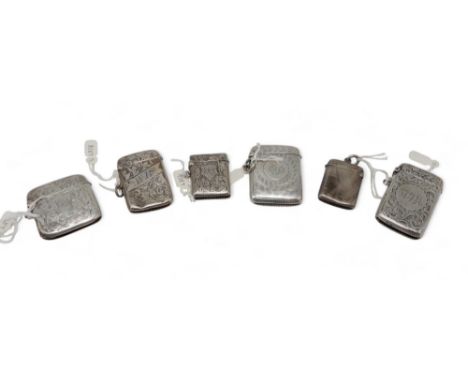 A collection of silver vestas, including an example by John Green &amp; Sons, Birmingam 1902, decorated in enamels with a thi