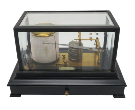 A barograph by John Trotter Ltd., 40 Gordon Street, Glasgow, housed in an ebonised case with frieze drawer containing spare c