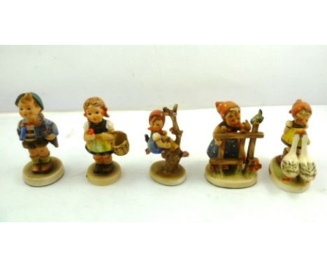 A SELECTION OF FIVE GOEBEL HUMMEL PORCELAIN FIGURES, including Goose Girl etc. 