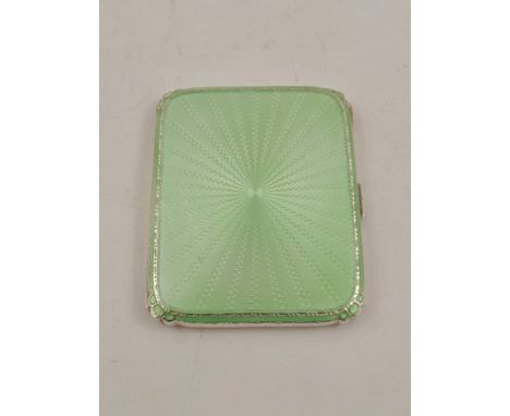 ADIE BROS A SILVER AND GREEN ENAMEL CIGARETTE CASE having engine turned and gilded interior, Birmingham 1935, 67mm x 85mm, 87