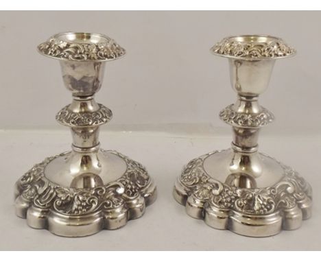 PRESTONS LTD. A SUITE OF 20TH CENTURY EPNS TABLE CANDLESTICKS comprising; a two branch three light and a pair of single stick