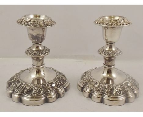 PRESTONS LTD. A SUITE OF 20TH CENTURY EPNS TABLE CANDLESTICKS comprising; a two branch three light and a pair of single stick