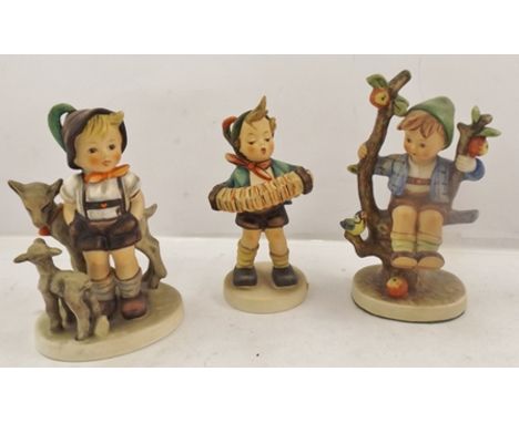 THREE GOEBEL HUMMEL FIGURES, Little Goat Herder, Accordion Boy and Boy on a bough, 15cm high 