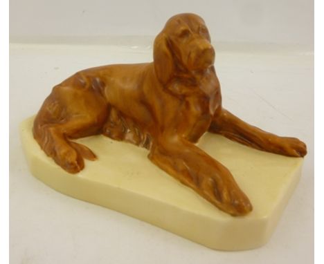 ROYAL WORCESTER MODELLED BY DORIS LINDNERA BONE CHINA MODEL OF A RED SETTER lying down, model no. 2871, date code 1931, 7.5cm