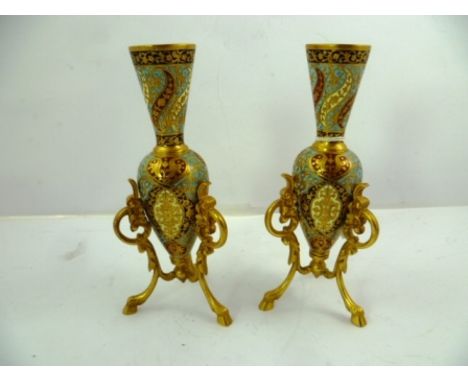 A PAIR OF CLASSICAL REVIVAL GILDED CHAMPLEVE VASES of amphora design, enamelled in pale and dark blue, crimson and cream with