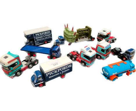 A collection of loose truck models to include Pollock trucks 