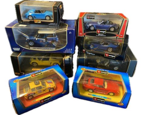 A collection of large scale models to include burago &amp; maisto sport cars 