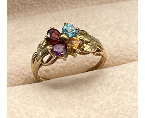 9ct yellow gold ring set with four heart shaped cut stones; Aquamarine, citrine, amethyst and garnet. [Ring size M] [2.26Gram