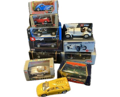 A collection of large scale classic sport car models includes Porsche &amp; mercedes SSKL 1931 