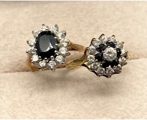 Two 9ct yellow gold rings; Large oval cut sapphire surrounded by CZ Stones, the other ring fitted with CZ Stones and blue Spi