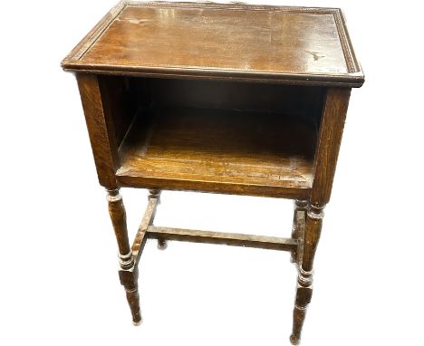 Antique cabinet, the rectangular top with moulded edging above an open shelf, raised on turned and block legs 