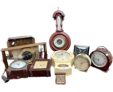 A large collection of vintage clocks to include Bakelite Smiths wall clock, Bivox dandy alarm clock along with an antique wal