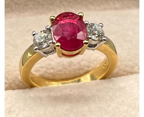 18ct yellow gold Ruby and diamond set ring. 0.54cts diamonds, oval cut ruby- 9.03x6.84x3.30mm [6.87garms] [Ring size M] 