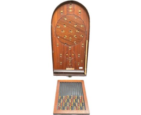 A Corinthian 42 bagatelle with shooter stick &amp; an Antique abacus 
