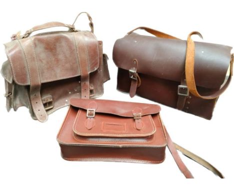 A collection of vintage railway leather satchel bags