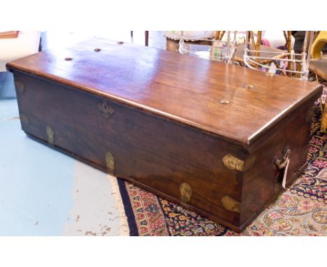 TRUNK, 19th century Anglo Colonial, Ceylonese teak and brass bound, with rising lid and carrying handles, 153cm W x 73cm D x 