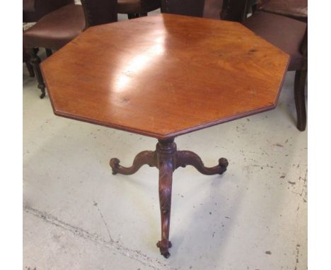 TRIPOD TABLE, George III mahogany, the octagonal tilt top on a turned column and tripod support with carved detail, 81cm W x 