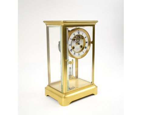 MANTEL CLOCK, late 19th century brass with four glass panels, dial with visible escapement, inscribed 'S. Bunneville, 11 Rue 