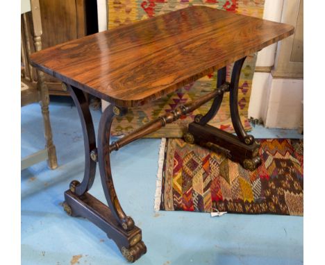 CENTRE TABLE, Regency rosewood, simulated rosewood and gilt metal mounted in the manner of George Bullock with 'c' scroll end